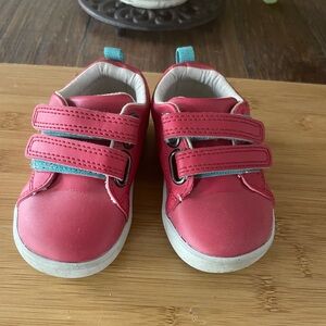 Ten Little  toddler everyday sneakers in red with red/aqua Velcro straps.